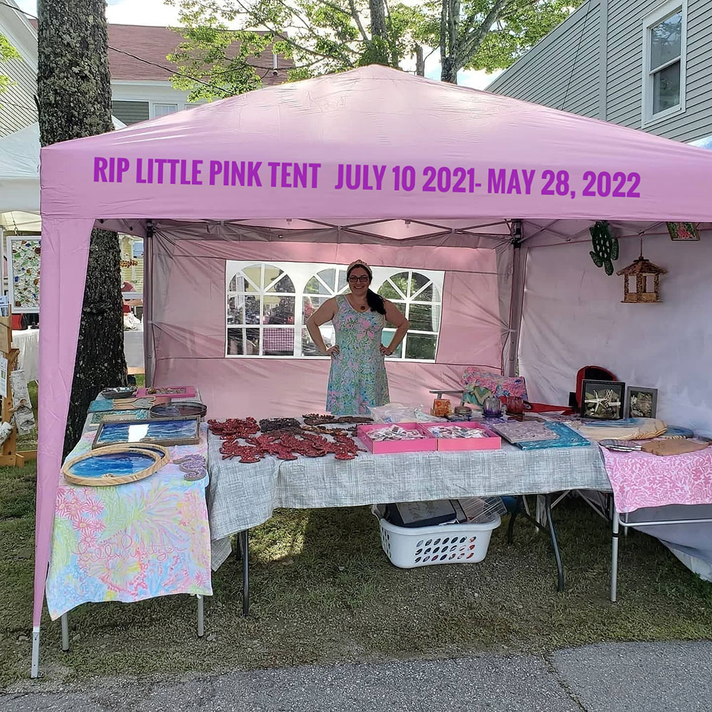 A photo of me in the little pink tent (R.I.P.)