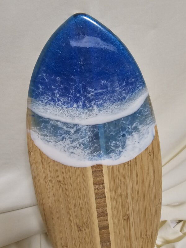 surfboard bamboo charcuterie with ocean resin waves